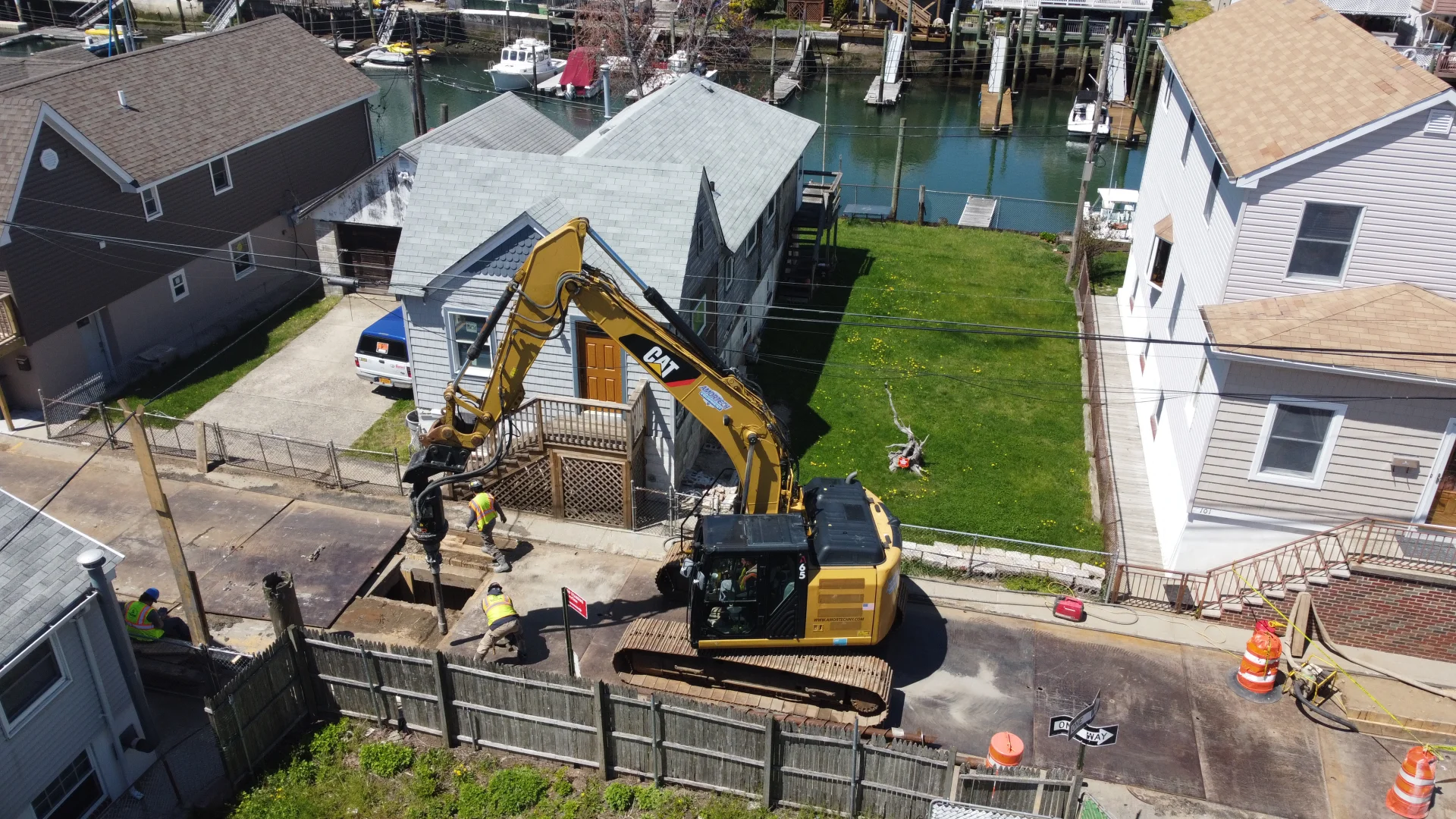 aerial view of drilling machine on residential road