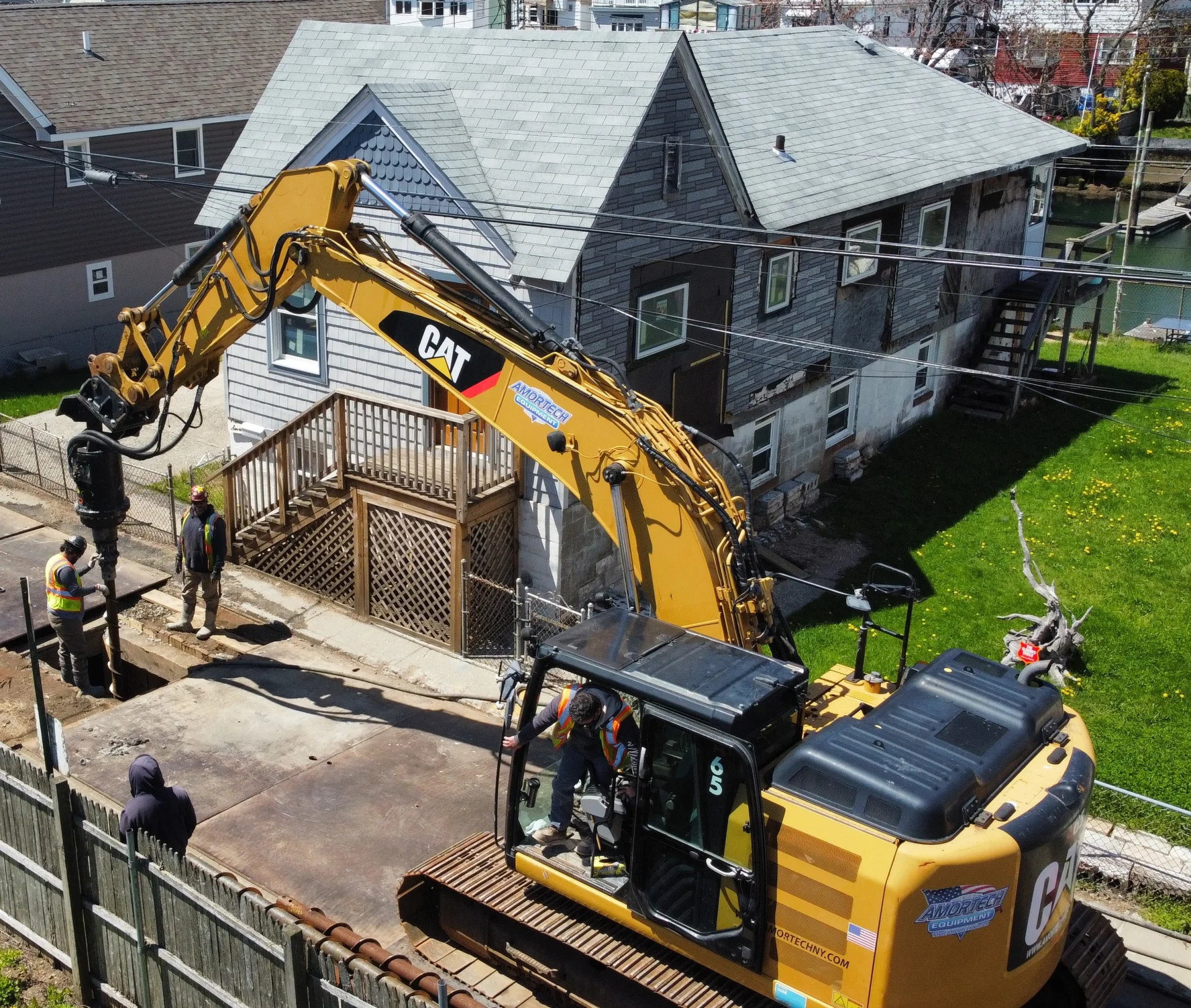 aerial view of drilling machine on residential road