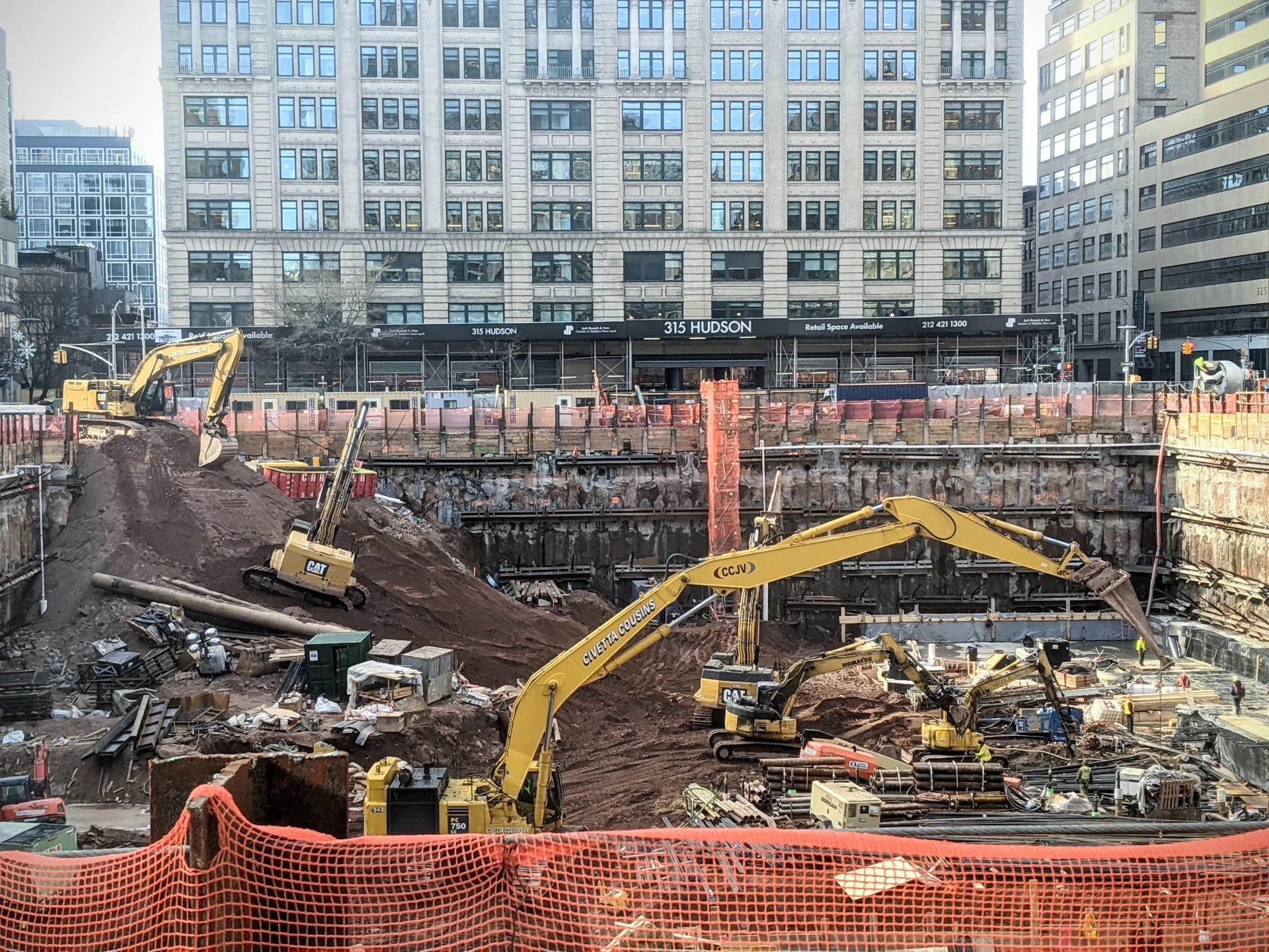 construction site with skyscraper in the background